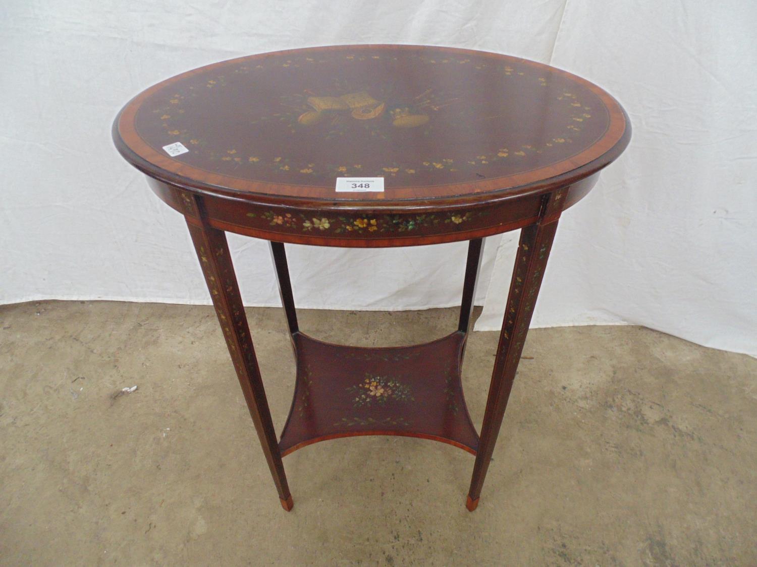 Mahogany inlaid cross banded painted occasional table the oval top on square tapering supports