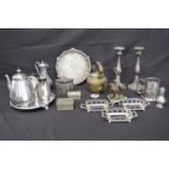 Collection of silverplate and metalware to include: four piece teaset, salver, pair of candlesticks,