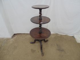 Oak three tier dumb waiter having three graduated circular tiers with spiral twist column,