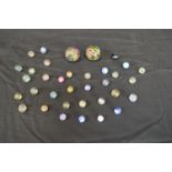 Collection of thirty five vintage lattice and onion skin marbles Please note descriptions are not