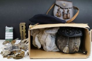 A collection of mixed militaria to include badges, buttons, patches, dagger sporrans and uniform.