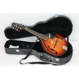Epiphone MM30 mandolin with mother of pearl inlay, chromed tuning keys, makers label to interior,