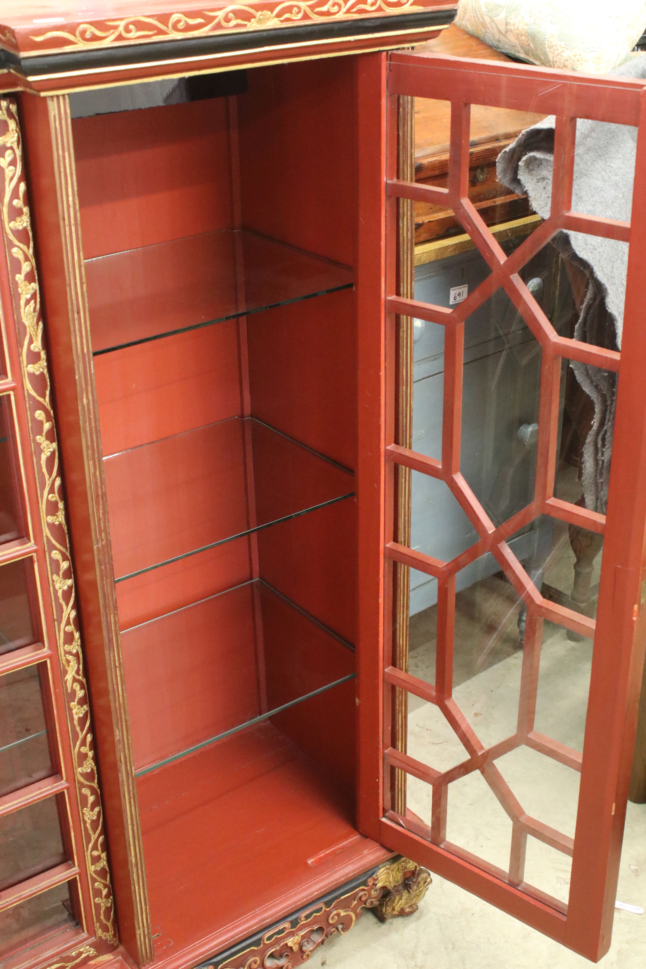 Red Lacquered and Gilt decorated Inverted Breakfront Display Cabinet in the Chinese manner, the - Image 9 of 14