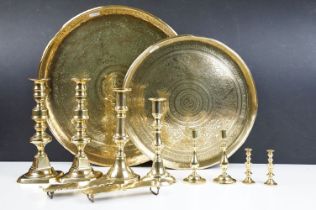 Collection of 20th Century brass to include two Indian engraved brass chargers, two pairs of knopped