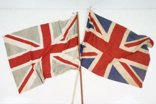 Two vintage cloth Union flags, with poles (measure approx 78cm x 55cm and 78cm x 59cm - excluding