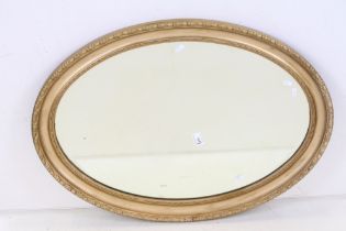 Gilt Framed Oval Mirror with bevelled edge, 86cm x 61cm