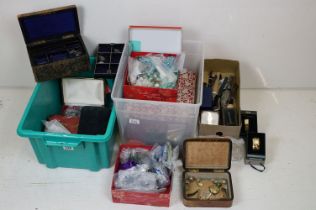 A large collection of vintage and contemporary costume jewellery to include silver examples together