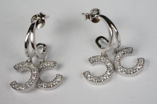 Pair of Silver and Designer style Earrings