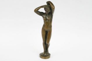 A bronze figure of a nude lady, stands approx 16cm in height.