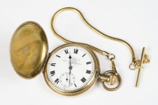 A vintage Elgin cased full hunter pocket watch with top winding movement.