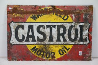 Vintage Wakefield Castrol Motor oil advertising sign having a red back ground with yellow, black and