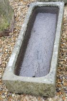 A garden stone trough planter of plain rectangular form. Measures approx 97cm wide.