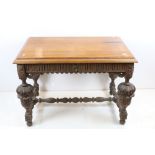 Jacobean Revival Oak Dining Table with carved frieze and heavily carved cup and cover supports, 79cm