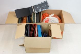 A large collection of loose used stamps together with a good selection of empty stamp albums,