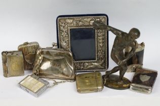 A small group of mixed collectables to include vesta cases, lighter, finger purse, photograph