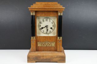 Early-to-mid 20th century German H. A. C oak 14 day strike mantel clock, no. 3270, the case of