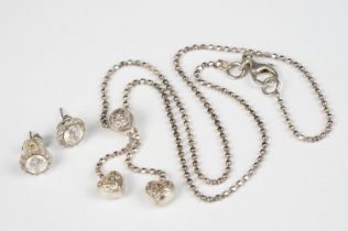 A ladies 925 sterling silver necklace and earrings.