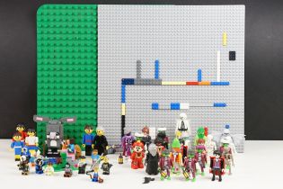 A collection of mixed playmobil and lego to include minifigs.