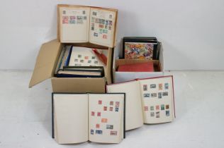 A large collection of British, Commonwealth and world stamps contained within stamp albums