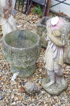 Reconstituted stone garden urn pot having moulded greek key and garland detailing. Measures approx