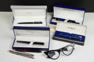 A collection of mixed pens to include Parker, Waterman and Dior examples.