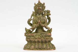 An oriental bronze figure of Guanyin, stands approx 10cm in height.