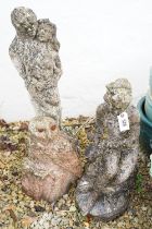 Three 20th Century stone garden statues to include classical female figures, an embracing couple and