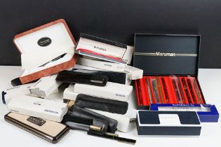 A collection of vintage cased pens to include Parker, Ronson and Waterman examples.