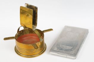 A trench art ashtray matchbox holder combination made from a brass artillery round together with