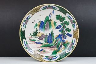 Early 20th Century Japanese Doucai dish / plate of round form. The plate painted with mountain