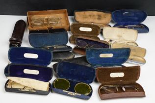 A collection of cased vintage spectacles / eye glasses.