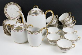 20th Century Limoges of France tea set with pink rose decoration (teapot, 12 cups & saucers, milk