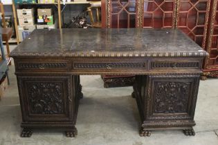 19th century Dark Oak Twin Pedestal Desk with three carved front drawers, each pedestal with heavily