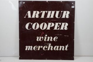 Vintage enamelled advertising sign for 'Arthur Cooper Wine Merchant' having a brown background