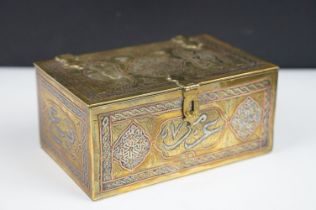 Late 19th / early 20th century Middle Eastern brass cigarette box with engraved decoration,