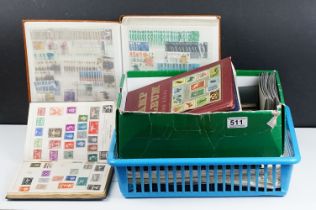 A collection of British and World stamps contained within albums together with loose examples,