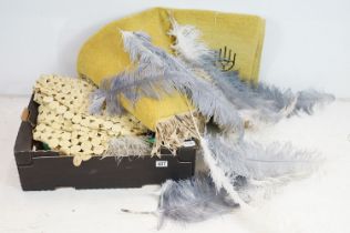 Collection of vintage feathers, together with a stole, rug, etc