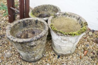 Three 20th Century reconstituted stone planter flower pots, each having moulded garland and