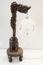 Art Deco era Chinese carved hard wood table lamp carved into the form of a Chinese dragon with