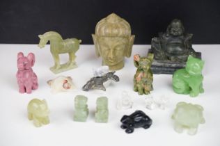 A small collection of carved stone ornaments to include Crystal, Jade and soapstone examples.