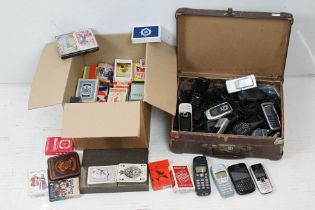 A collection of vintage mobile phones and chargers to include Blackberry, Nokia, Sony...etc..