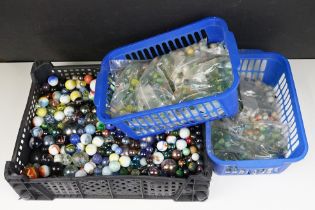 A large collection of mixed marbles to include various colours and sizes.