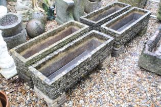 Set of four sandford stone reconstituted stone garden planters of rectangular form having moulded