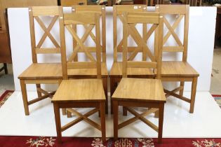 Set of Six Contemporary Pale Oak Dining Chairs with crossed back panels and solid seats, each