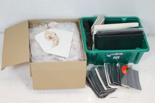 A collection of loose mainly British stamps together with a quantity of stock sheets and pages.