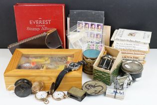 A box of mixed collectables to include pocket watches, wristwatch, Smiths car clock, fishing tackle,