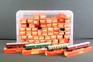 64 Boxed Triang OO gauge items of rolling stock, mainly coaches, to include R333, R222, R320, R21,