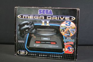 Retro Gaming - A boxed Sega Mega Drive II 16-Bit games console with two controllers, manual, power