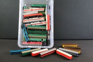 Around 40 Triang OO gauge items of rolling stock featuring coaches, observation carriages, dummys