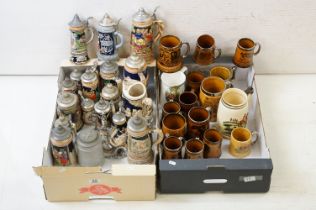 Collection of assorted German beer steins to include musical examples. Tallest measures 27cm tall.